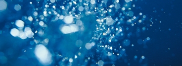 Air bubbles in blue coloured water.